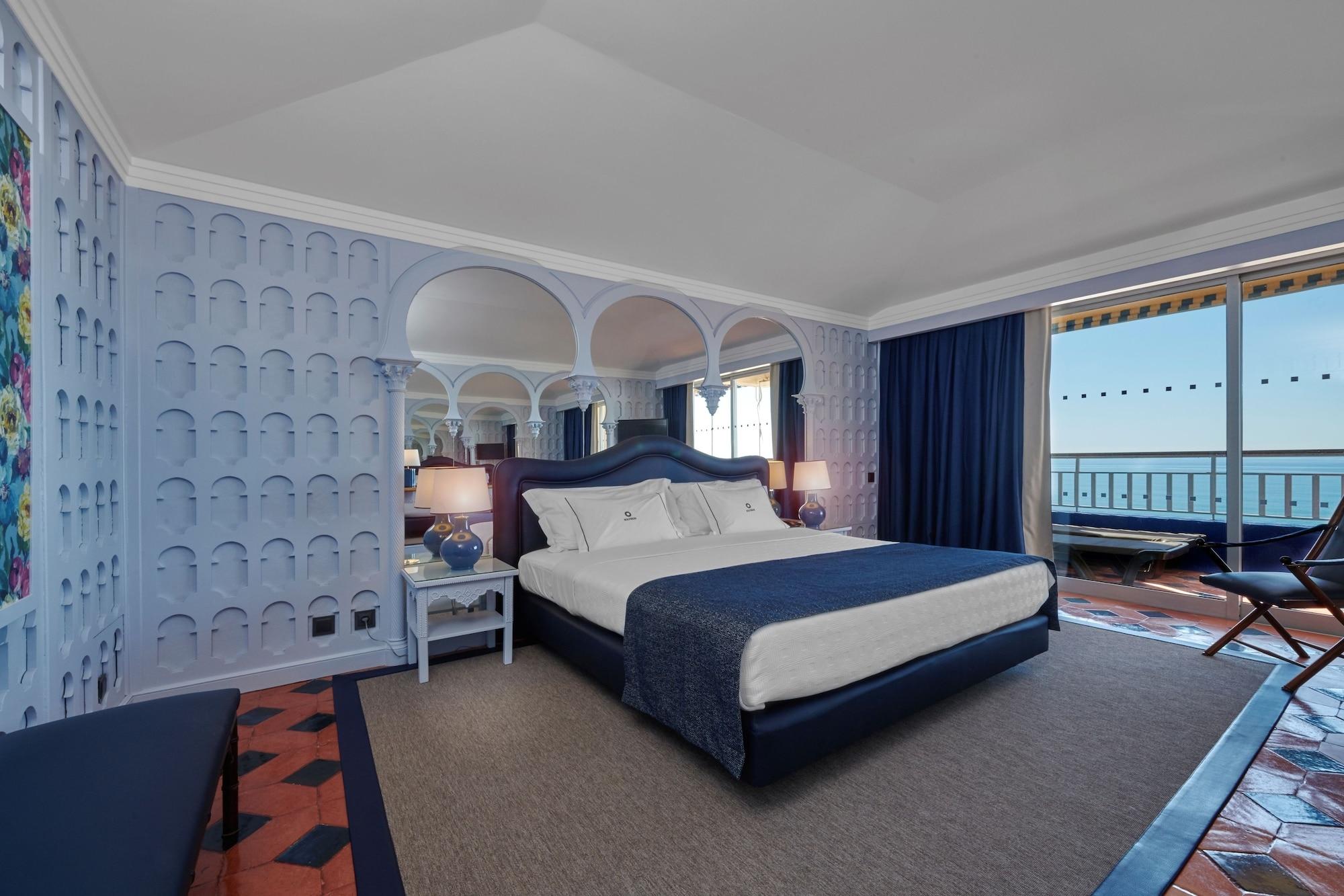 Algarve Casino Hotel Portimao Bagian luar foto A bedroom in the hotel